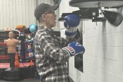 Fighter on punching bag